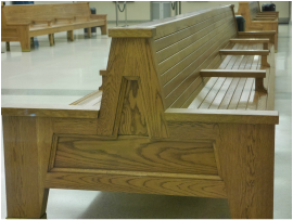 Picture: empty oak benches in a train station waiting room www.catmichaelswriter.com 
