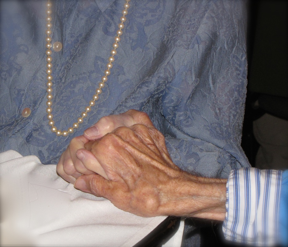 Picture: Love spans the ages: Close up shot of the hands of an elderly man and woman, clasping each other lovingly. @ http://www.catmichaelswriter.com/cats-corner-blogging-about-books-writing-and-more/six-simple-ways-to-keep-on-the-write-track